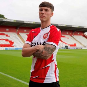 Steve Evans turned to his contacts book yet again in summer 2023; signing forward Charlie McNeill on loan from Manchester United